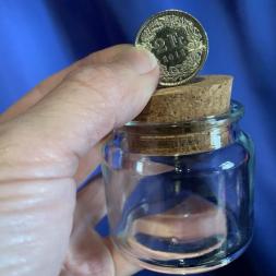 MÜNZE IN FLASCHE